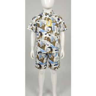 White mannequin modeling a boys' two-piece set featuring a short sleeve collared shirt and matching shorts with an abstract brown, blue, and white pattern.