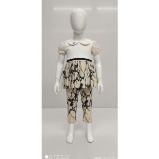 Off-white and black marble print girls tunic and pant set on mannequin