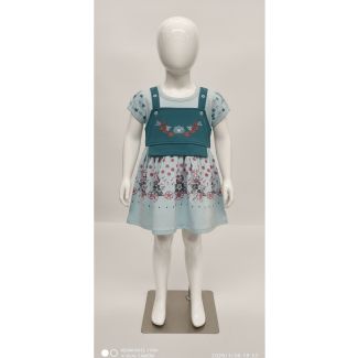 Young girl's light blue floral printed dress layered under a teal pinafore with embroidery, India.