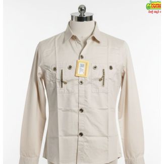 Cream cotton shirt with full sleeves and two chest pockets with zippers.