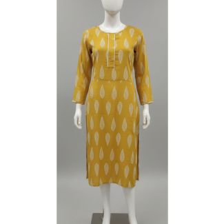 Mustard yellow cotton kurti with ivory leaf print, 3/4 sleeves, displayed on a mannequin.