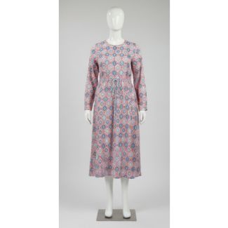 Pink geometric print cotton maxi dress with long sleeves and drawstring waist, displayed on a mannequin.