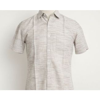 Beige cotton short-sleeved shirt with a textured pattern and a classic collar, displayed on a mannequin