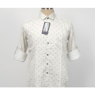 Close-up of an off-white men's shirt with blue micro-dots, rolled sleeves