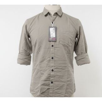 Taupe cotton shirt with collar, cuffed sleeves, and front pocket, displayed on a mannequin