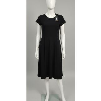 Black A-line dress with short sleeves on a mannequin, India