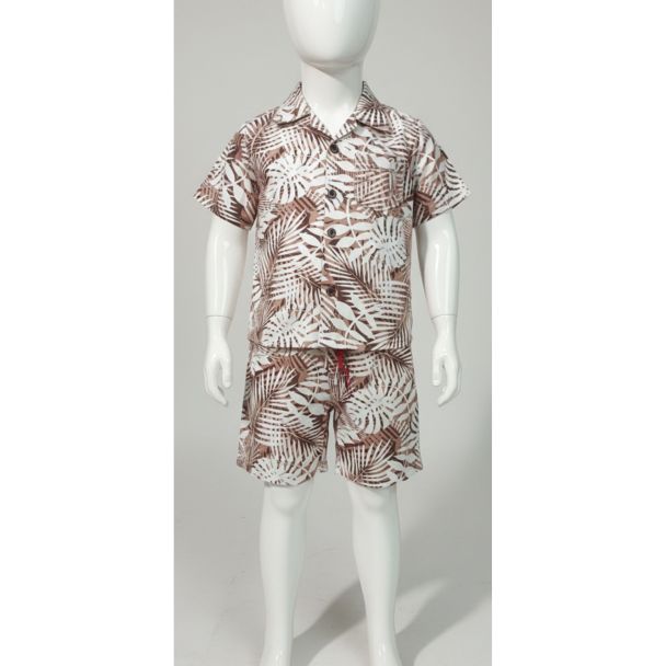 White mannequin modeling a boys two-piece set with brown and white dense tropical leaf print.
