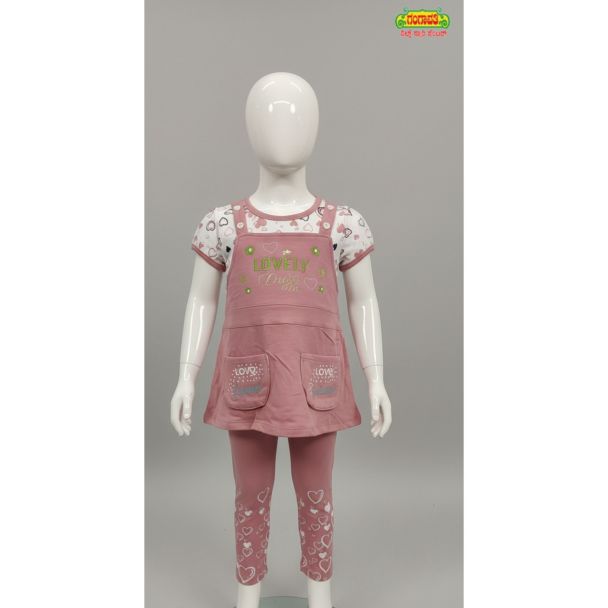 Girls dusty rose pink overall dress and leggings set with heart prints displayed on a white mannequin in India