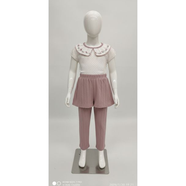 Girls' pink polka dot set with collared top and matching pants, India