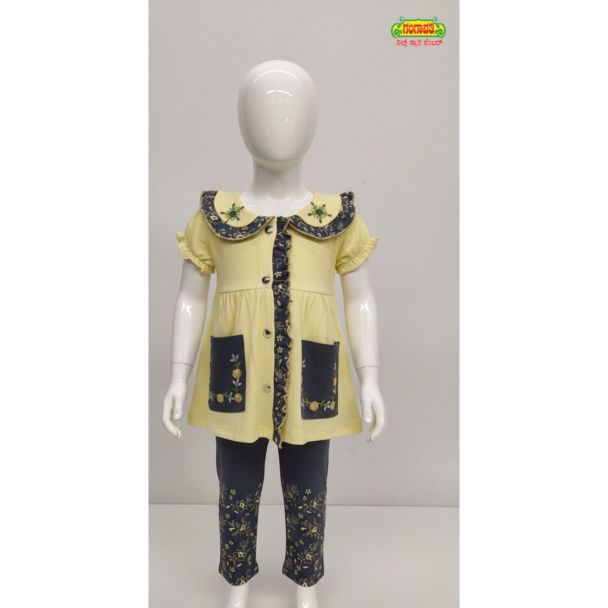 Girls yellow floral cotton kurti pant set with ruffled collar