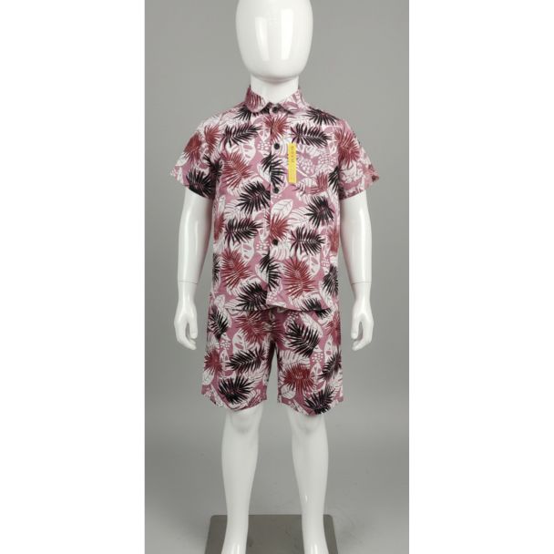 White mannequin wearing a pink and black tropical leaf print short sleeve shirt and matching shorts set.