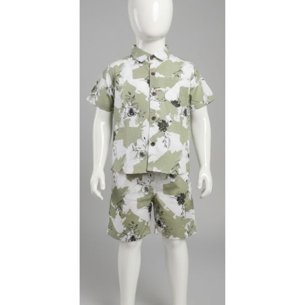 Child mannequin wearing a short-sleeve sage green and white abstract floral print button-up shirt and matching shorts.