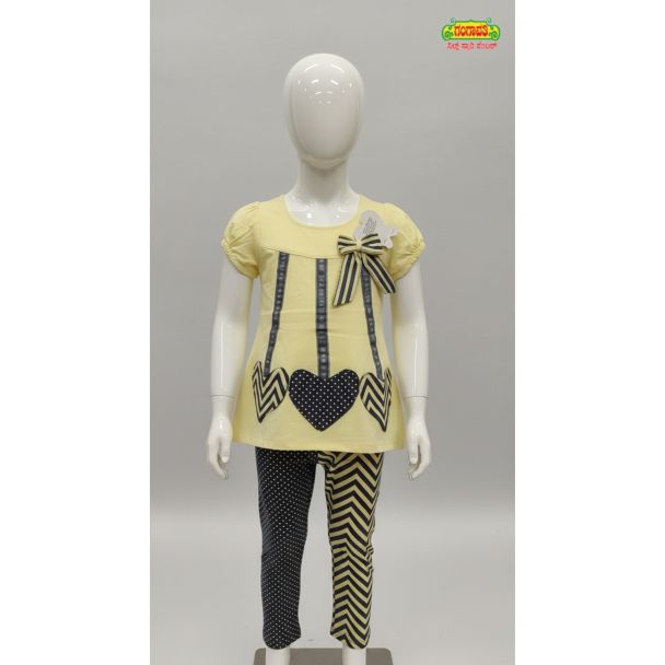 Yellow girls tunic with heart print and patterned pants set