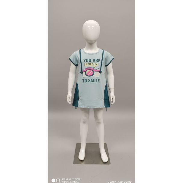Light blue girls tunic dress with short sleeves and a large camera graphic print standing on a mannequin in India