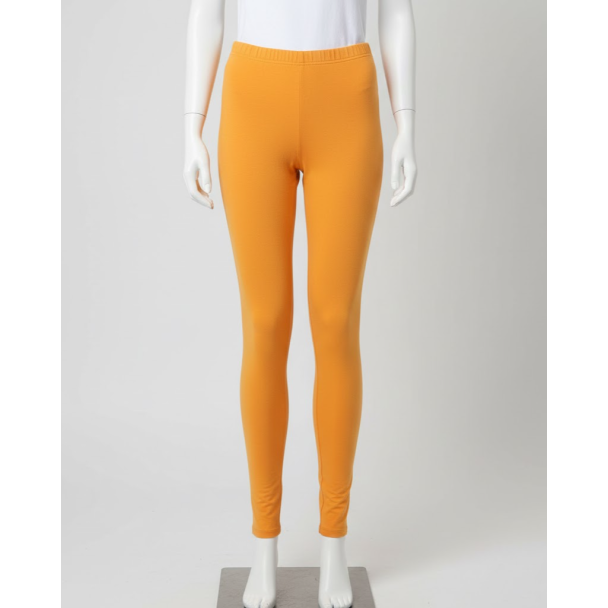 Mannequin wearing solid mango color 4-way cotton stretch ankle length leggings