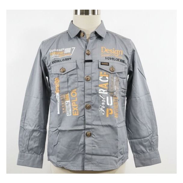 Gray cotton long-sleeved shirt with printed design, buttons, and a collared neckline, displayed on a mannequin.