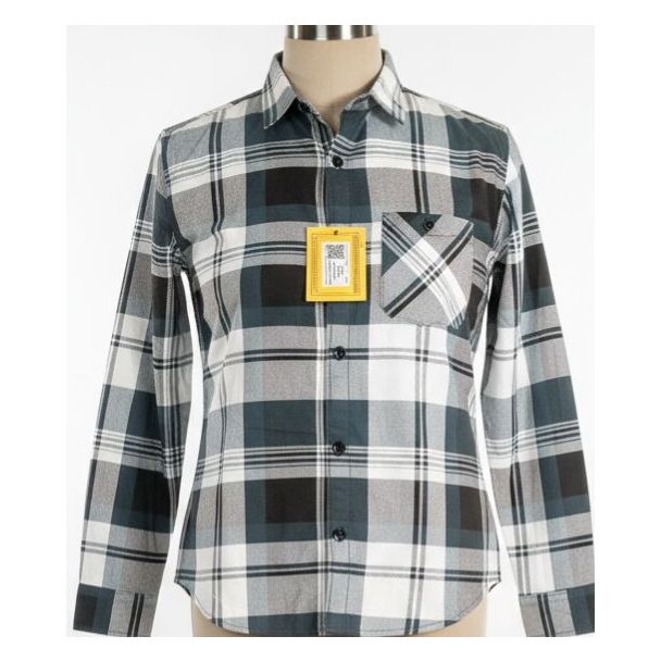 Green and black plaid button-down shirt with long sleeves and a collar on a mannequin.