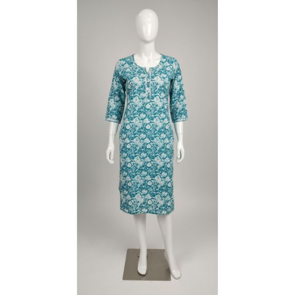Teal green and white dense floral print cotton A-line kurti on a mannequin