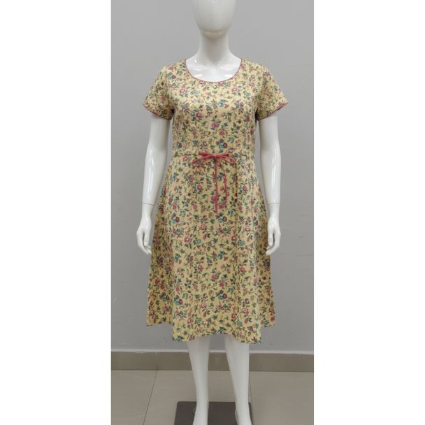Light yellow ditsy floral print A-line dress with short sleeves and pink tie waist