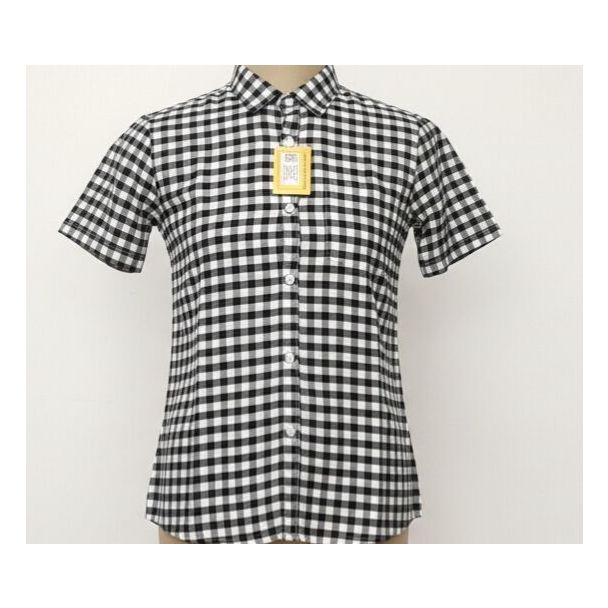 Close-up of a black and white gingham check cotton shirt with short sleeves and a button-down front.
