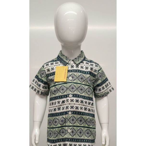 Boys short sleeve patterned cotton shirt displayed on a white mannequin torso India