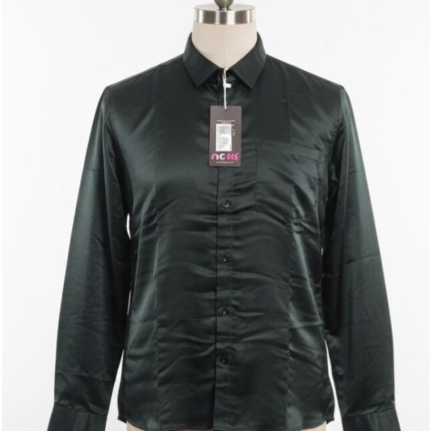 Emerald green satin formal shirt with classic collar and long sleeves. A men's shirt on a mannequin