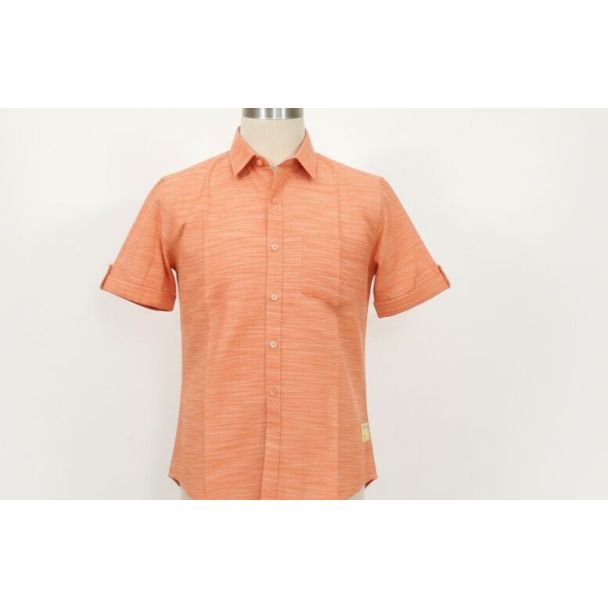 Close-up of an orange textured cotton short-sleeve button-up shirt on a mannequin.