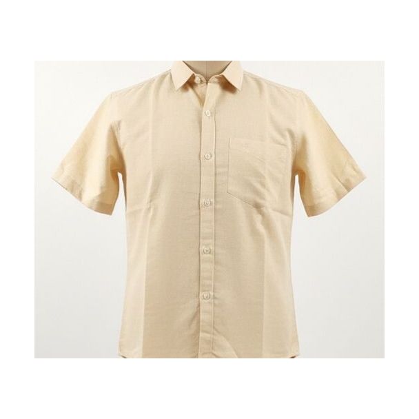 Close-up of a plain tan short sleeve collared shirt on a mannequin